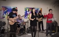 La Bella Cubana на крыше башен Азриэли